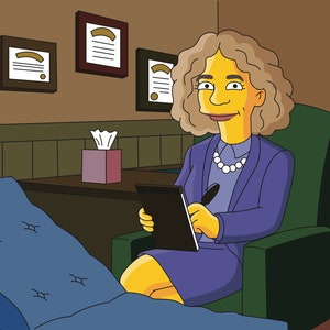May include: A woman with yellow skin and brown hair sits in a green chair in an office setting. She is wearing a purple blazer and a pearl necklace. She is holding a black notepad and a pen in her hands. There are diplomas on the wall behind her.