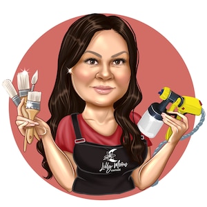May include: A woman with long brown hair is holding paintbrushes and a spray paint gun. She is wearing a red shirt and a black apron with the text "Lilly Moon Vintage".