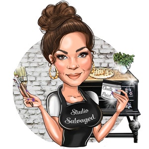 May include: A woman with brown hair in a bun is holding paintbrushes and a jar of chalk paint. She is wearing a black apron with the text "Studio Salvaged" on it. She is standing in front of a black dresser with a white brick wall in the background.