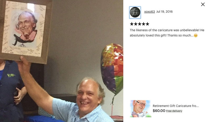 May include: A framed caricature drawing of a man with a large nose and a big smile. The drawing is in a brown frame and has a white background. The man is wearing a pink shirt and a blue tie. The drawing is surrounded by signatures.