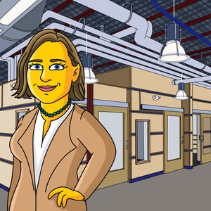 May include: A woman with brown hair and a tan blazer stands in a room with a blue wall and a beige ceiling. The room has several doors and windows. The woman is smiling and looking at the camera.