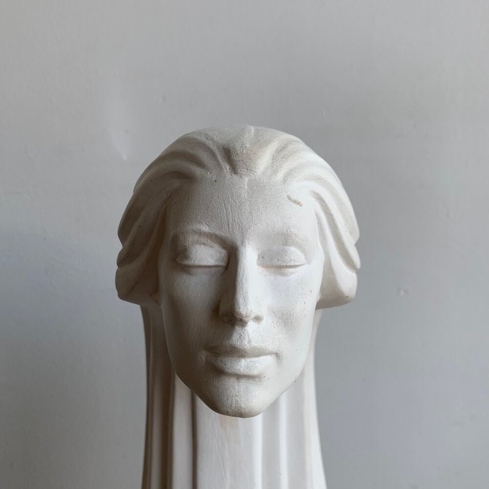 Post modern plaster face statue #1