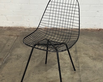 Early Eames low slung wire chair