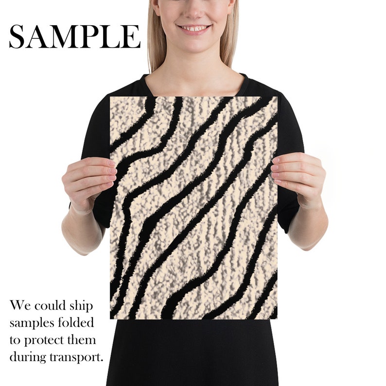 May include: A rectangular print featuring a textured beige background with bold, black, wavy lines. The word "SAMPLE" is printed in large, black capital letters at the top. The print is held by a person.