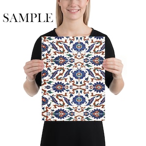 May include: A white poster with a repeating pattern of blue, red, and green floral designs. The pattern is symmetrical and has a traditional Turkish style.
