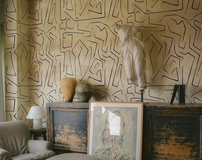 Sophisticated simplicity: black lines on beige wallpaper for a minimalist touch in your home decor