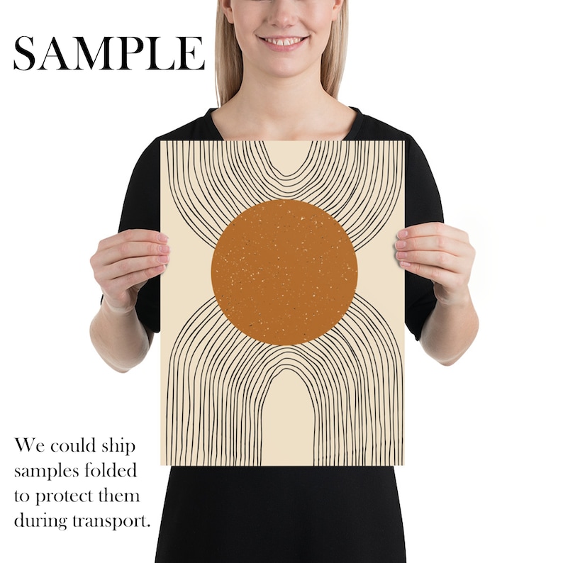 May include: Abstract art print with a large orange circle and black lines on a cream background.
