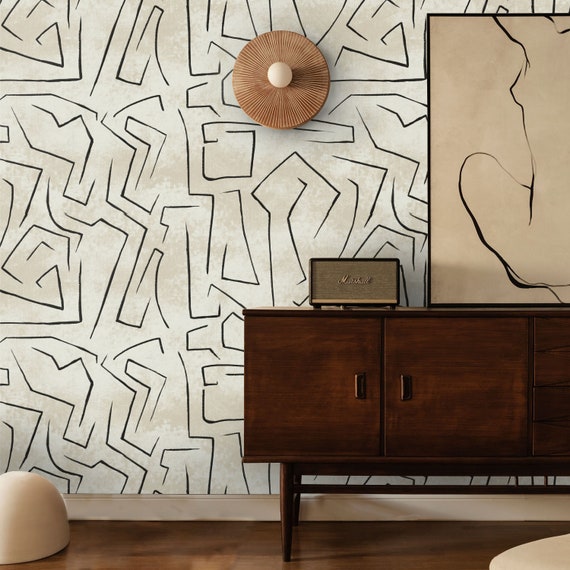 Sophisticated simplicity: black lines on beige wallpaper for a minimalist touch in your home decor