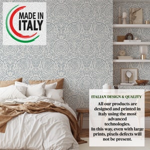 May include: A bedroom interior with a white bed with a brown blanket and white pillows. The wall behind the bed is covered in a blue and white patterned wallpaper. The text "MADE IN ITALY" is visible in the upper left corner of the image. The text "ITALIAN DESIGN & QUALITY" is visible in the lower right corner of the image. The text below reads "All our products are designed and printed in Italy using the most advanced technologies. In this way, even with large prints, pixels defects will not be present."