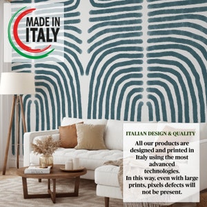 May include: A white couch with brown and beige pillows sits in front of a wall with a blue and white abstract pattern. The wall has the text "MADE IN ITALY" in a circle. The text "ITALIAN DESIGN & QUALITY" is in a box on the right side of the image. The text below reads: "All our products are designed and printed in Italy using the most advanced technologies. In this way, even with large prints, pixels defects will not be present."