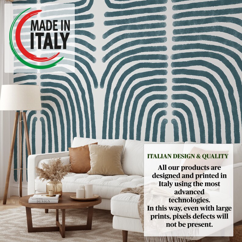 May include: A white couch with brown and beige pillows sits in front of a wall with a blue and white abstract pattern. The wall has the text "MADE IN ITALY" in a circle. The text "ITALIAN DESIGN & QUALITY" is in a box on the right side of the image. The text below reads: "All our products are designed and printed in Italy using the most advanced technologies. In this way, even with large prints, pixels defects will not be present."