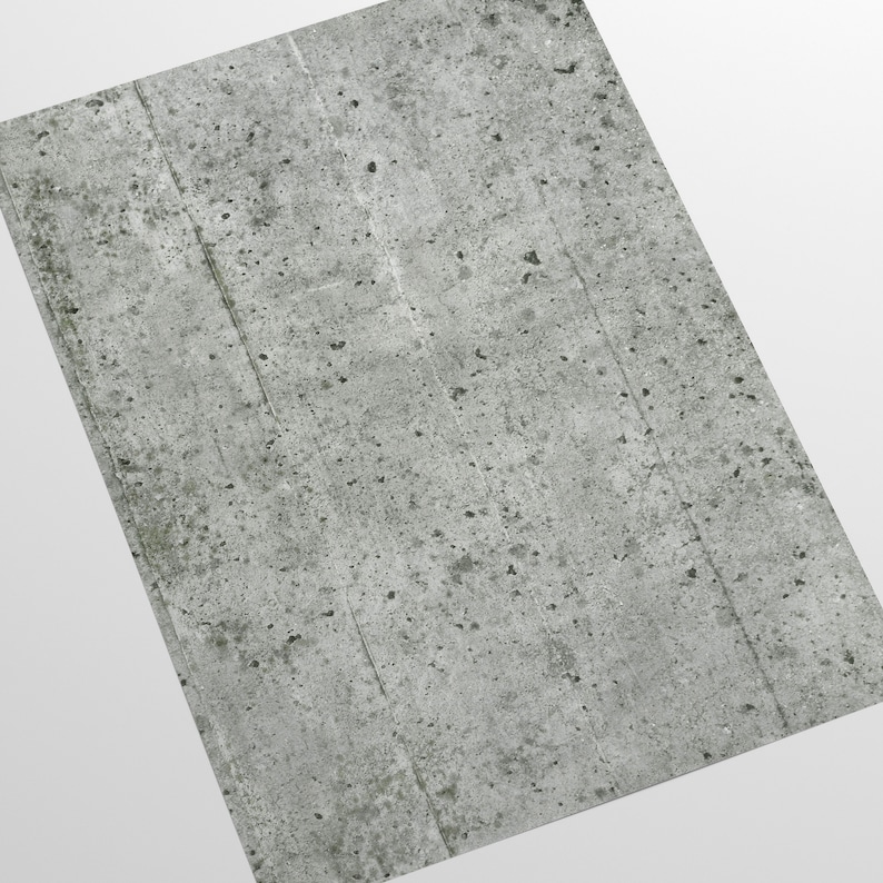 Puede incluir: Primer plano de una pared de hormig&oacute;n gris con una superficie rugosa y texturizada. La pared tiene un ligero tono verdoso y muestra signos de desgaste.