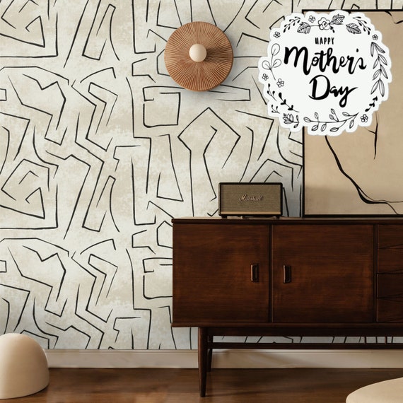 Sophisticated simplicity: black lines on beige wallpaper for a minimalist touch in your home decor