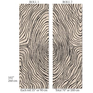 May include: Two rolls of wallpaper with a beige background and a black, organic, wood grain pattern. Each roll is 35 inches wide and 102 inches tall. The total width of both rolls is 70 inches, or 180 cm.