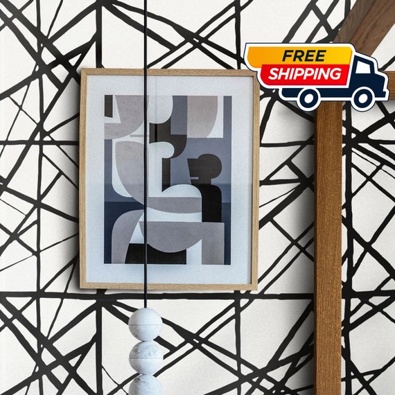 Create a Striking Feature Wall with this Black and White Abstract Stripe Wallpaper - Perfect for Modern and Contemporary Spaces!