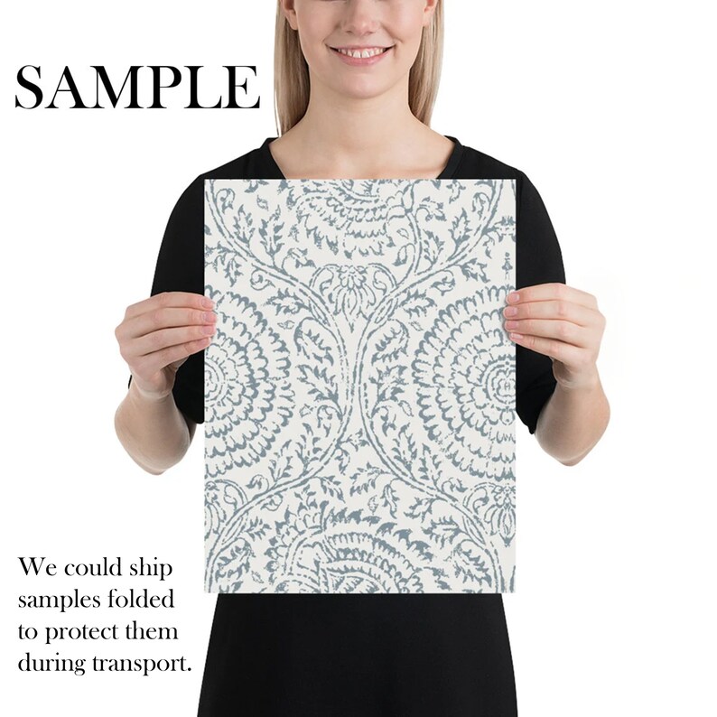May include: A white and blue floral print with a repeating pattern of stylized flowers and leaves. The print is on a white background and the flowers are a light blue color. The print is a sample and the text "SAMPLE" is visible at the top of the image.