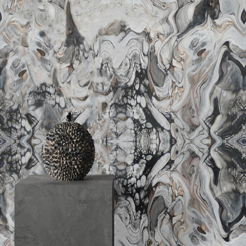 May include: A black and white abstract marble wallpaper with a spiky, dark gray decorative sphere on a gray concrete pedestal.