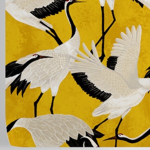 May include: A repeating pattern of white cranes with black wingtips and red markings on a mustard yellow background. The cranes are depicted in various poses, some with wings spread, others standing or in flight. The design has a textured, artistic appearance.