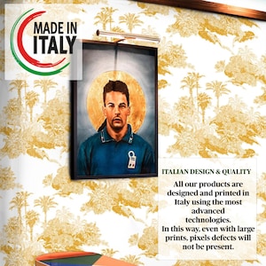 May include: A framed portrait of a man in a blue shirt with a gold background. The text "MADE IN ITALY" is visible in the upper left corner of the image. The text "ITALIAN DESIGN & QUALITY" is visible in the lower right corner of the image. The text below reads "All our products are designed and printed in Italy using the most advanced technologies. In this way, even with large prints, pixels defects will not be present."