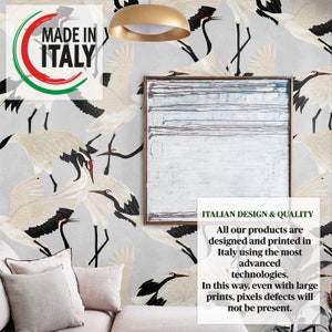May include: A room with crane-patterned wallpaper in black, white, and red. The image includes a framed abstract painting, a sofa with pillows, and text that reads "MADE IN ITALY" and "ITALIAN DESIGN & QUALITY".