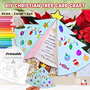 May include: A DIY Christian tree card craft with the text "Print, Color, Cut." The image shows a printable digital download of a Christmas tree card with colorful ornaments and the message "May the Lights of the season remind you that Jesus is the Light of the World. Merry Christmas."