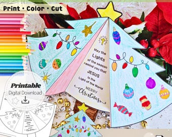 May include: A DIY Christian tree card craft with the text "Print, Color, Cut." The image shows a printable digital download of a Christmas tree card with colorful ornaments and the message "May the Lights of the season remind you that Jesus is the Light of the World. Merry Christmas."
