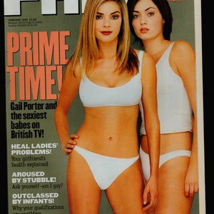 May include: Magazine cover of FHM from February 1999 featuring two women in white lingerie. The cover text includes "PRIME TIME!" and "Gail Porter and the sexiest babes on British TV!" Additional text includes article titles and a price.