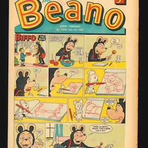 Op de afbeelding: Een strippagina uit The Beano, met een cartoonfiguur genaamd Biffo de Beer. Biffo maakt toffee-appels en deelt ze met een muis. De strip bevat de tekst "Ik maak vandaag toffee-appels - mijn favoriete snoepje." en "Ik vraag me af of de muis er een wil?"