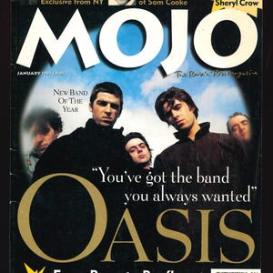 Pode incluir: Uma capa de revista com uma foto da banda Oasis, com o título "MOJO" e o texto "You've got the band you always wanted".