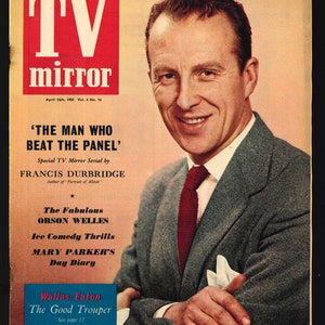 May include: A vintage magazine cover featuring a man in a suit and tie. The magazine is called "TV Mirror" and the headline reads "'The Man Who Beat The Panel'" with the text "Special TV Mirror Serial by Francis Durbridge".