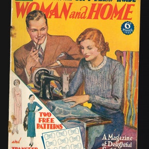 May include: A vintage magazine cover featuring a couple working on a sewing project. The cover is yellow with the title "WOMAN and HOME" in red and black lettering. The text "FREE: 2 Patterns and GIFT Transfer INSIDE" is printed in black at the top of the cover. The magazine cover is dated "March 1933".