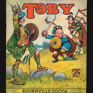 May include: A vintage magazine cover featuring a cartoon illustration of three men in kilts. The magazine is titled "TOBY" and has the text "GRAND WORKING MODEL INSIDE" and "VOL. 3, No. 1. SEPT., 1923." The cover also features an advertisement for Bournville Cocoa.