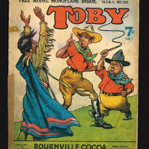 May include: A comic book cover featuring three cartoon characters. The cover is yellow with red and blue accents. The title of the comic book is "TOBY" in large red letters. The text "FREE MODEL MONOPLANE INSIDE" is printed at the top of the cover. The text "7d NET" is printed in the upper right corner. The text "BOURNVILLE COCOA" is printed at the bottom of the cover. The text "QUALITY AND FLAVOUR" is printed in the lower left corner. The text "MADE UNDER IDEAL CONDITIONS" is printed in the lower right corner.