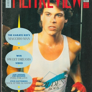 May include: A magazine cover featuring Rob Lowe, a young actor, with the title "Film Review" and the text "Hollywood's Young Blood".