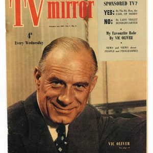 May include: A vintage magazine cover featuring a smiling man in a suit and tie. The magazine is called "TV Mirror" and the cover text includes "Sponsored TV?" and "My Favorite Role by Vic Oliver".