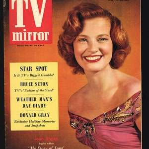 May include: A vintage magazine cover featuring a woman with red hair wearing a pink dress with gold embellishments. The magazine is called "TV Mirror" and the cover features the text "Star Spot", "Bruce Seton", "Weather Man's Day Diary", and "Donald Gray".