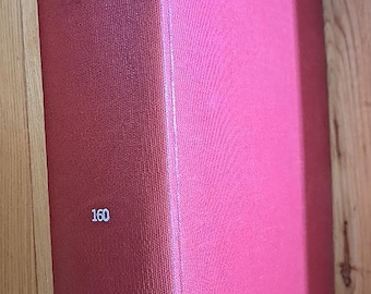 May include: A burgundy-colored book with the title "VOGUE" and the text "JULY-DEC. 1972" printed on the spine. The book is numbered "160".