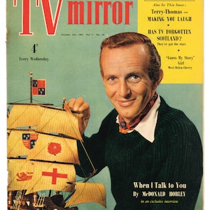 May include: A vintage magazine cover featuring a man holding a model ship. The magazine is called "TV Mirror" and the cover features the text "Terry-Thomas on Making You Laugh" and "When I Talk to You by McDonald Hobley".