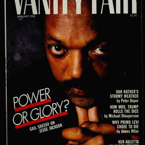 Pode incluir: Uma capa de revista com uma foto em preto e branco de Jesse Jackson, com o título "POWER OR GLORY?" e o texto "GAIL SHEEHY ON JESSE JACKSON". A revista é Vanity Fair, janeiro de 1988.