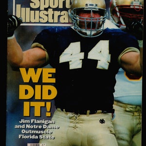 May include: Cover of Sports Illustrated magazine from November 22, 1993, featuring a football player in a gold helmet and navy blue jersey with the number 44. The headline reads "WE DID IT!" and "Jim Flanigan and Notre Dame Outmuscle Florida State."