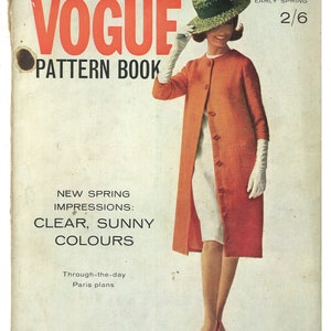 May include: A vintage Vogue Pattern Book cover featuring a woman wearing a red coat, white gloves, and a green hat. The cover text reads "Vogue Pattern Book" and "Early Spring 2/6".