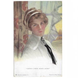 May include: A vintage postcard with a portrait of a woman with auburn hair, wearing a white collared shirt and a black tie. The text "ABSENCE CANNOT HEARTS DIVIDE" is printed at the bottom. Artwork signed by Philly Balkam.