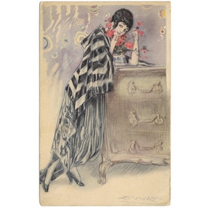 Stara pocztówka przedstawiająca kobietę w czerni i bieli, czerwone kwiaty w wazonie autorstwa Achille Mauzan, elegancka monochromatyczna moda, pocztówka Mauzan ok. 1918 r.