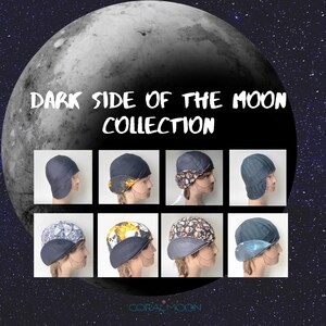 May include: A collection of eight skull caps with ear flaps, displayed in a grid against a moon background. The caps feature various solid colors and graphic prints, including skulls and flames. The text reads DARK SIDE OF THE MOON COLLECTION.