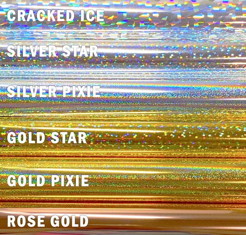 May include: Six different holographic vinyl rolls with the names "Cracked Ice", "Silver Star", "Silver Pixie", "Gold Star", "Gold Pixie", and "Rose Gold" printed on them.