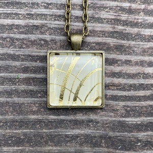 Gold and Cream Square Pendant
