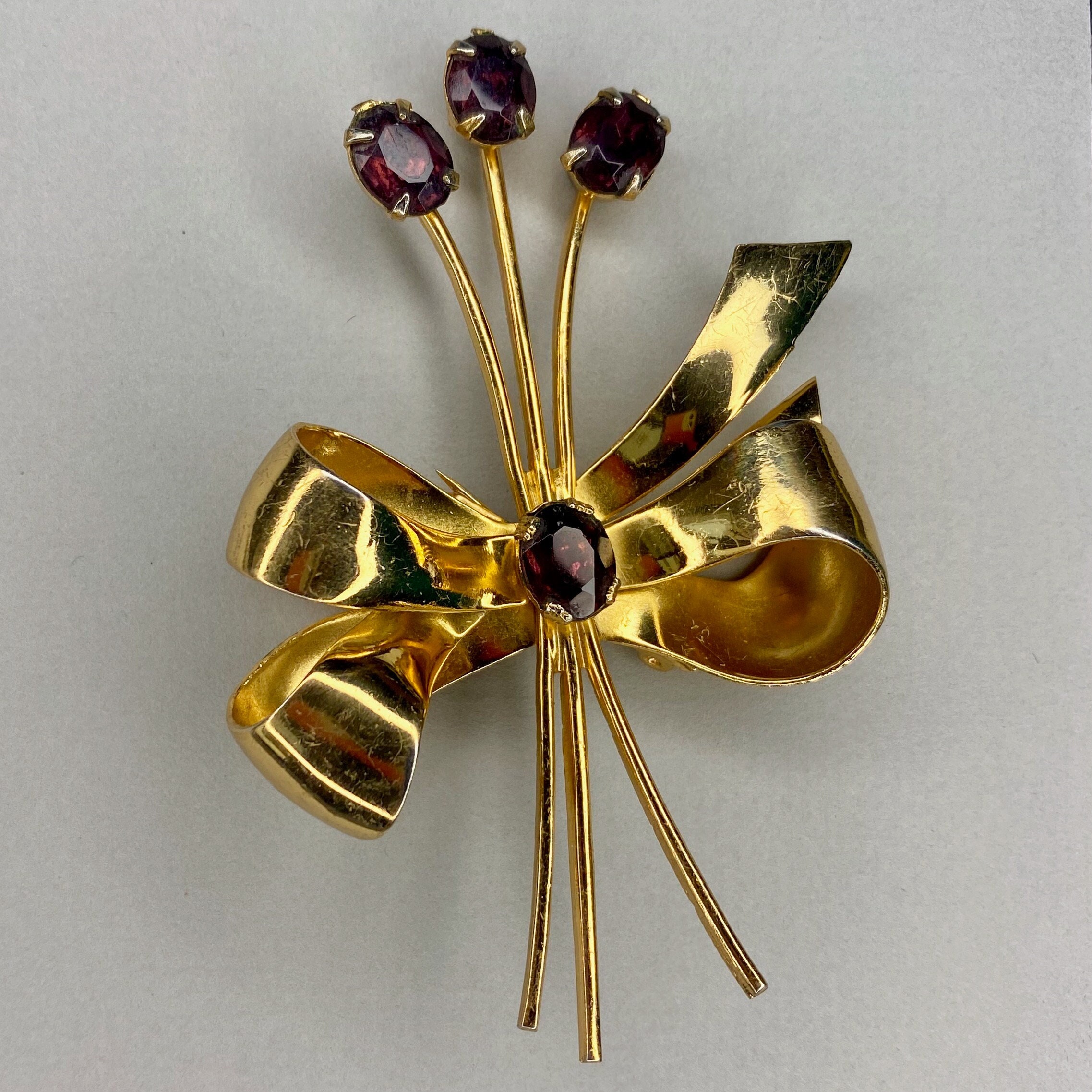 Vintage Coro Gold Tone Ribbon Brooch, Purple Rhinestone  display picture 1