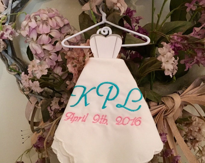 Monogrammed handkerchief with a date.