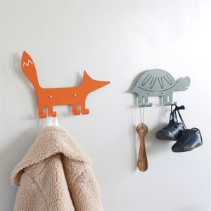 A metal hook in the shape of fox in a orange color. Kids wall hook. Gift for kids. Organizer for kids clothes.