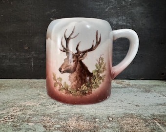 Vintage shaving mug featuring a staghorn deer
